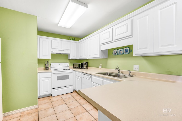 kitchen featuring white appliances, under cabinet range hood, white cabinetry, and light countertops