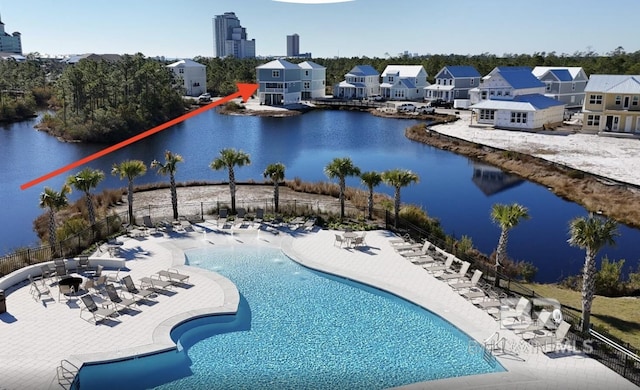 2760 Salt Dr, Orange Beach, AL 36561 - pool featuring a water view, a patio, and fence