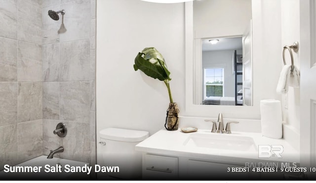 2760 Salt Dr, Orange Beach, AL 36561 - bathroom with toilet, vanity, and bathing tub / shower combination