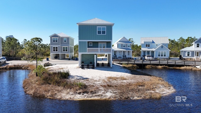 2760 Salt Dr, Orange Beach, AL 36561 - back of house with fence and a water view