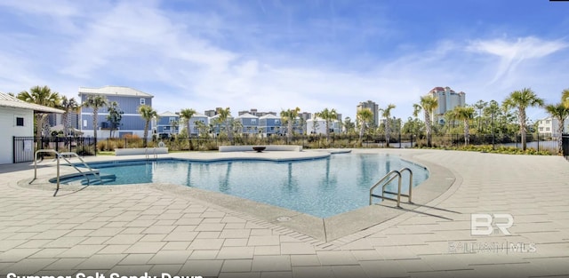 2760 Salt Dr, Orange Beach, AL 36561 - community pool with fence, a patio area, and a residential view