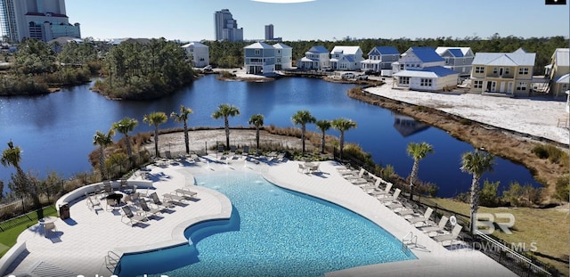 2760 Salt Dr, Orange Beach, AL 36561 - community pool featuring a patio, a water view, and fence