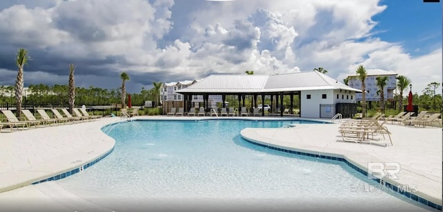 2760 Salt Dr, Orange Beach, AL 36561 - community pool with a patio and fence