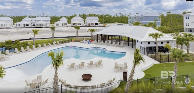 2760 Salt Dr, Orange Beach, AL 36561 - community pool with a residential view, a patio, and fence