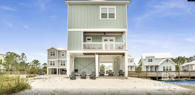 2760 Salt Dr, Orange Beach, AL 36561 - back of house with board and batten siding