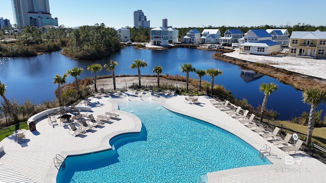 2760 Salt Dr, Orange Beach, AL 36561 - community pool featuring fence, a water view, and a patio