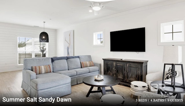 2760 Salt Dr, Orange Beach, AL 36561 - living room with a ceiling fan and wood finished floors