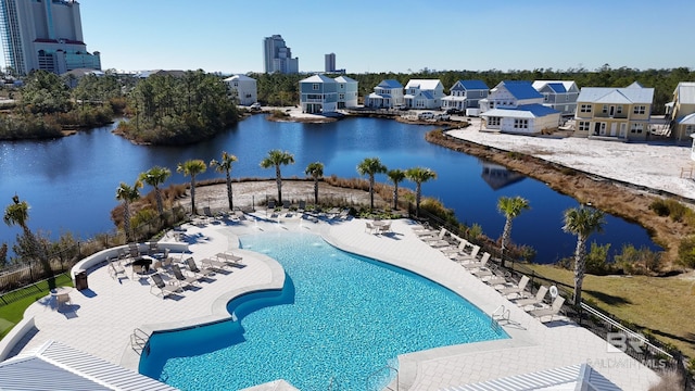 2760 Salt Dr, Orange Beach, AL 36561 - community pool featuring a residential view, a water view, a patio, and fence