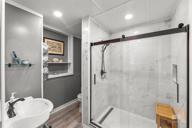 7410 Helton Dr, Foley, AL 36535 - full bathroom with a marble finish shower, a sink, toilet, recessed lighting, and wood finished floors