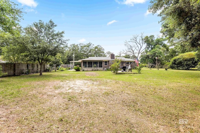 7410 Helton Dr, Foley, AL 36535 - view of yard with a sunroom