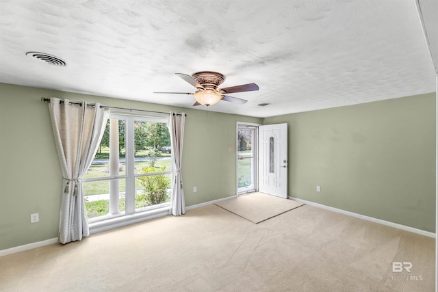 7410 Helton Dr, Foley, AL 36535 - carpeted empty room featuring baseboards and a ceiling fan