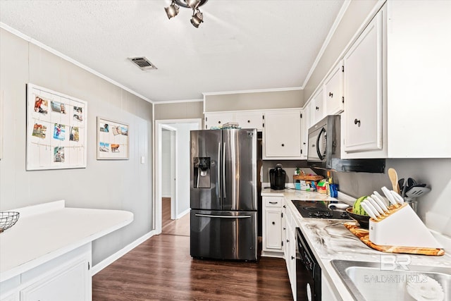 kitchen with crown molding, white cabinets, dark hardwood / wood-style flooring, and black appliances