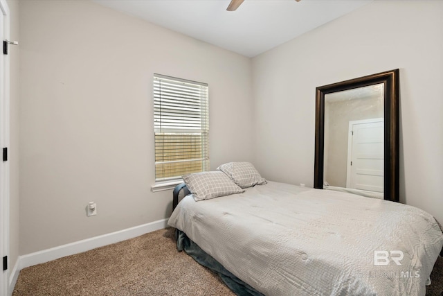 bedroom with ceiling fan and carpet flooring