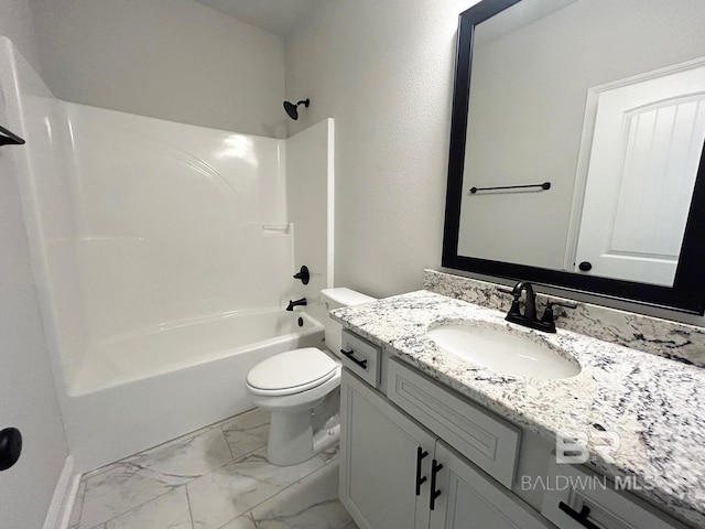 full bathroom with vanity, toilet, and shower / washtub combination