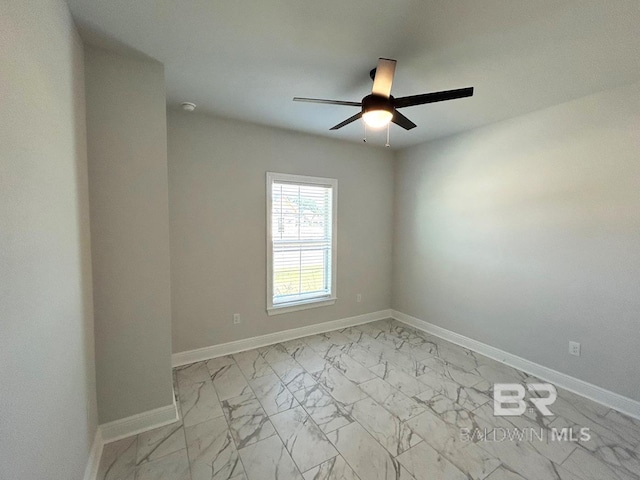 spare room featuring ceiling fan