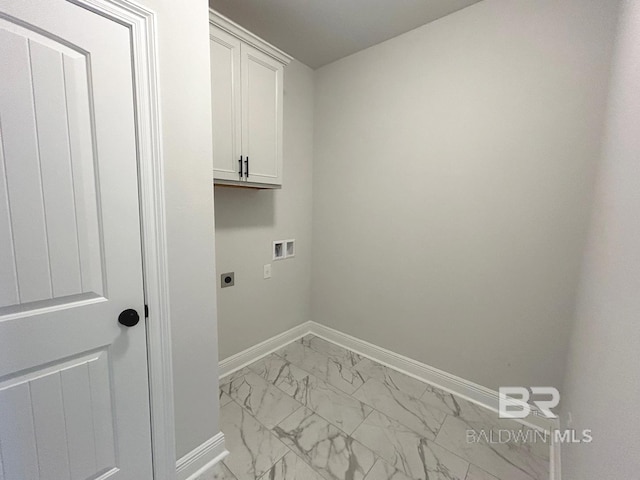 laundry area with electric dryer hookup, cabinets, and washer hookup