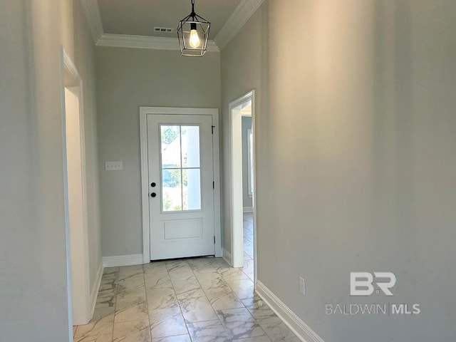 entryway featuring crown molding