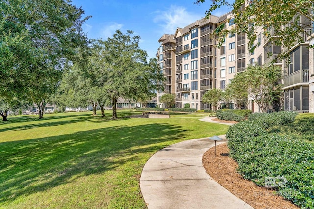 view of home's community featuring a yard