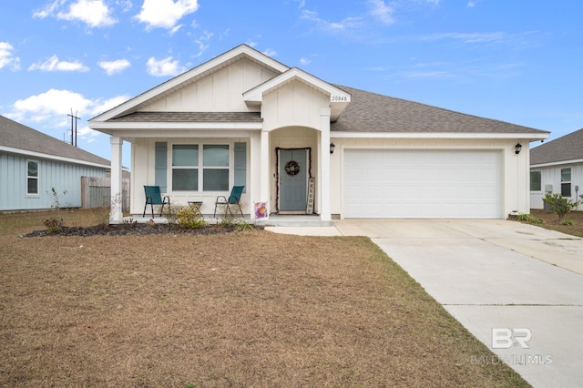 view of front of house with a garage and covered porch