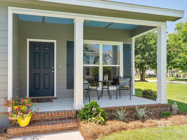 property entrance featuring covered porch