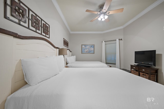 bedroom featuring a ceiling fan and crown molding