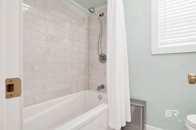 full bath featuring shower / tub combo and toilet