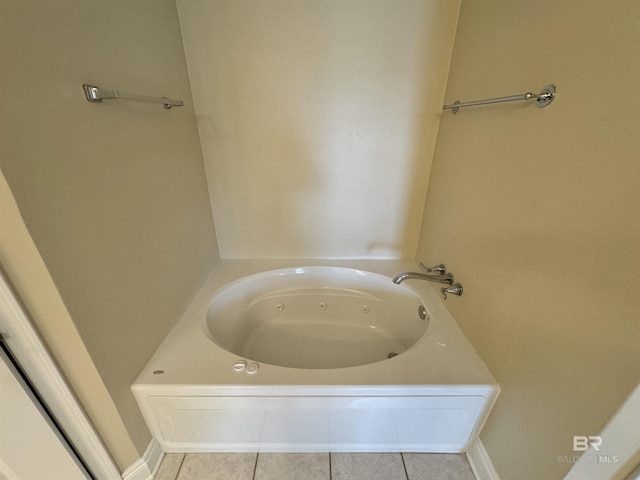 full bath featuring tile patterned flooring and a jetted tub