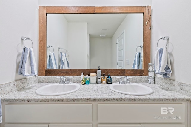 bathroom featuring vanity