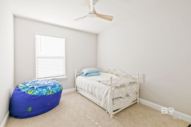 bedroom with ceiling fan and carpet floors