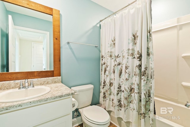 full bathroom featuring vanity, toilet, and shower / tub combo with curtain