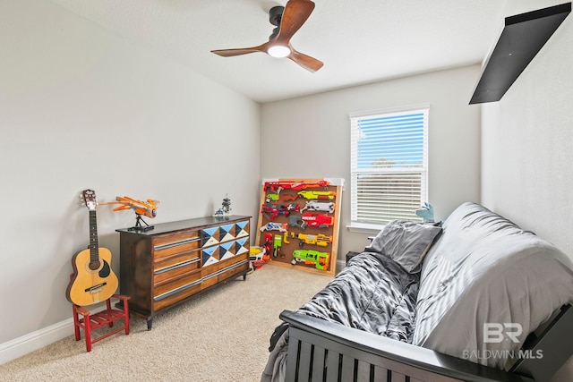 carpeted bedroom with ceiling fan