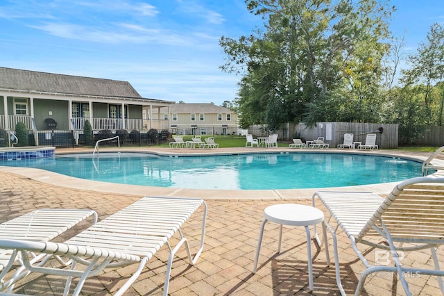 view of pool with a patio area