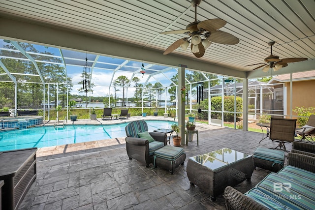 8585 Bay Harbor Rd, Elberta, AL 36530 - view of swimming pool with a lanai, a patio area, a pool with connected hot tub, and ceiling fan