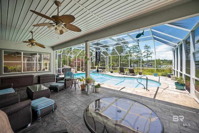 8585 Bay Harbor Rd, Elberta, AL 36530 - swimming pool featuring a patio area, a ceiling fan, outdoor lounge area, and a lanai