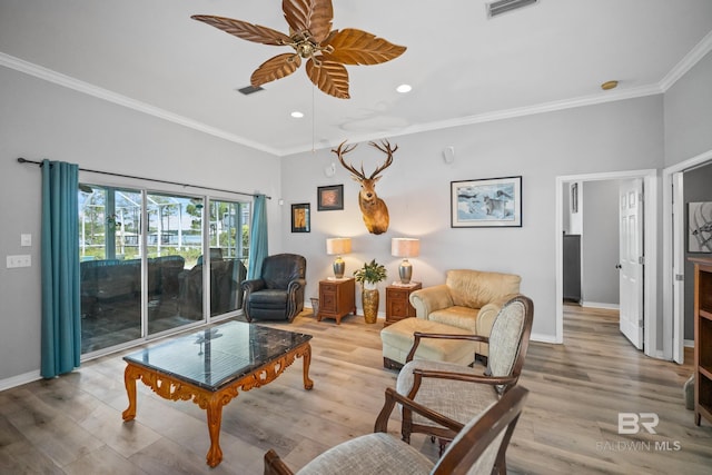 8585 Bay Harbor Rd, Elberta, AL 36530 - living area featuring recessed lighting, ceiling fan, crown molding, and light wood-style flooring