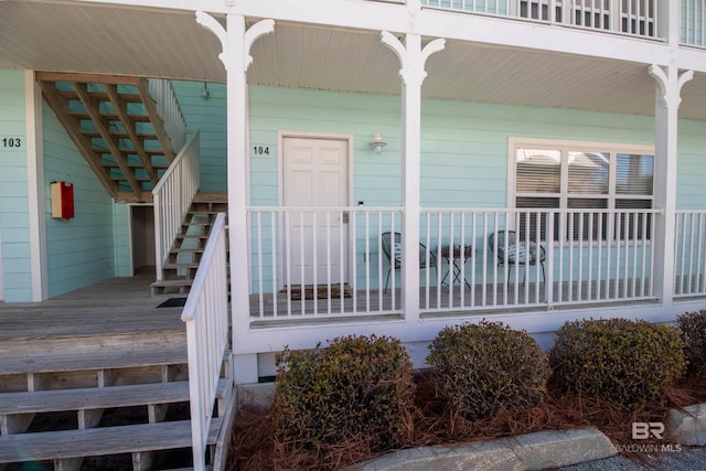 doorway to property with covered porch