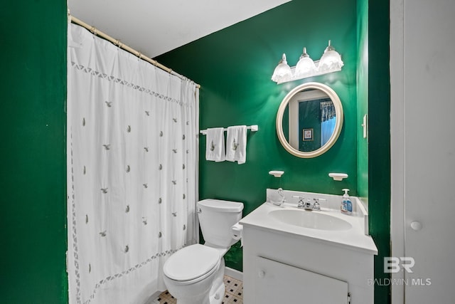 bathroom featuring tile patterned floors, walk in shower, vanity, and toilet