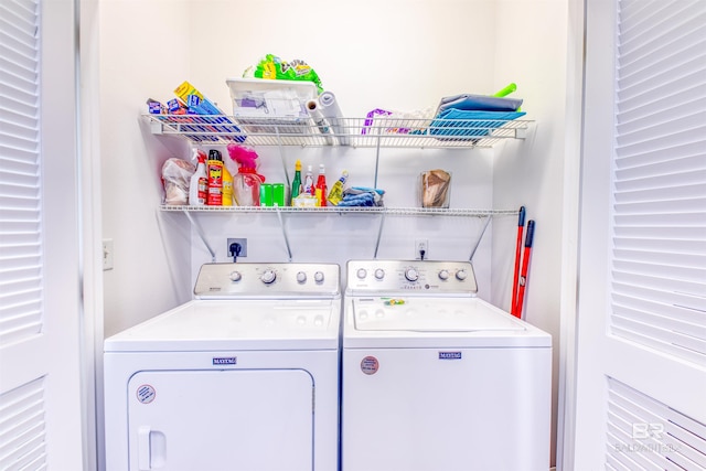 washroom featuring independent washer and dryer and hookup for an electric dryer