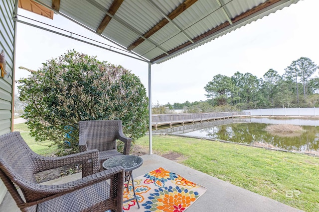 view of patio featuring a water view