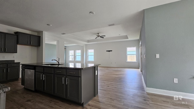 1897 Carly St, Foley, AL 36535 - kitchen featuring a sink, dishwasher, ceiling fan, healthy amount of natural light, and a textured wall
