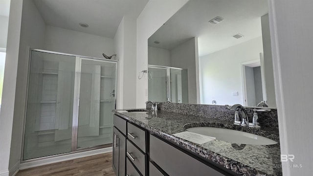 1897 Carly St, Foley, AL 36535 - full bath featuring a shower stall, wood finished floors, and double vanity