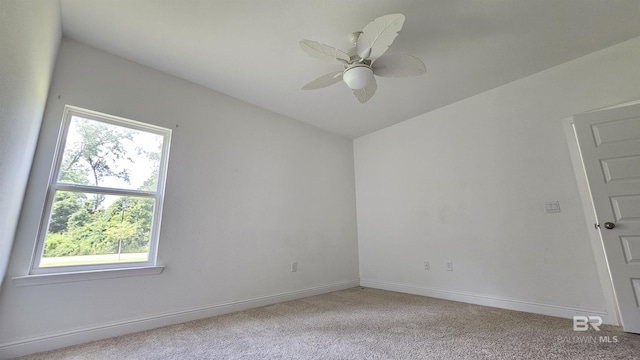 1897 Carly St, Foley, AL 36535 - spare room with healthy amount of natural light, light carpet, baseboards, and a ceiling fan