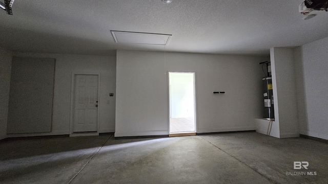 1897 Carly St, Foley, AL 36535 - garage featuring baseboards and water heater