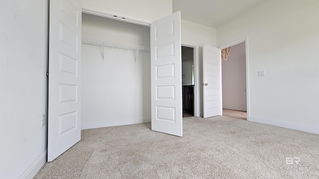 1897 Carly St, Foley, AL 36535 - unfurnished bedroom featuring carpet flooring, a closet, and baseboards