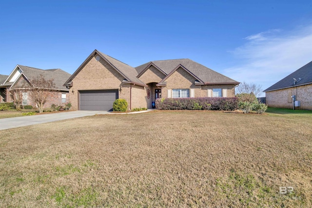 7091 Rocky Road Loop, Gulf Shores, AL 36542 - ranch-style house with concrete driveway, an attached garage, brick siding, and a front yard