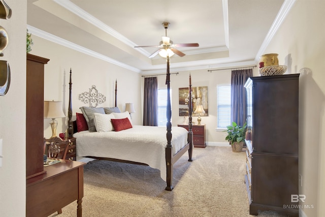 7091 Rocky Road Loop, Gulf Shores, AL 36542 - bedroom featuring a tray ceiling, crown molding, light carpet, and ceiling fan
