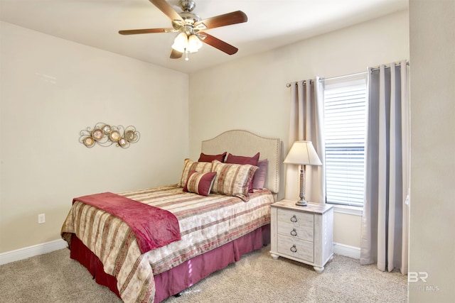7091 Rocky Road Loop, Gulf Shores, AL 36542 - bedroom featuring light colored carpet, baseboards, and a ceiling fan