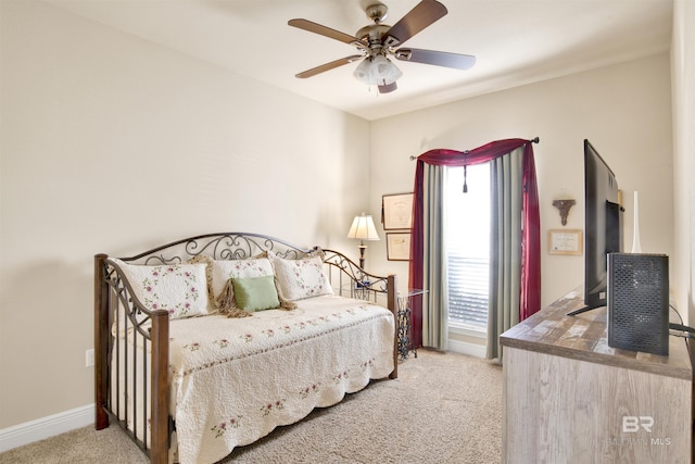 7091 Rocky Road Loop, Gulf Shores, AL 36542 - bedroom with baseboards, a ceiling fan, and carpet floors