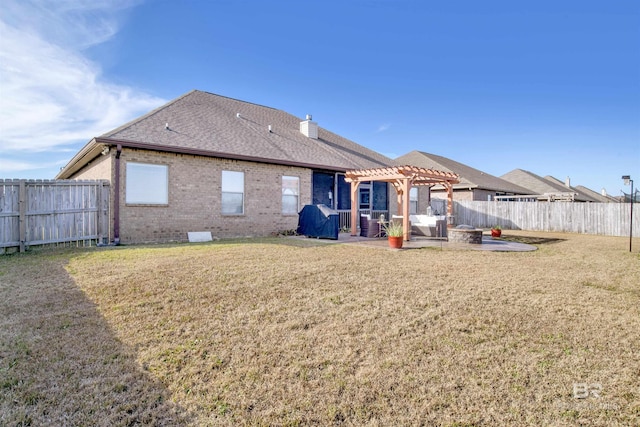 7091 Rocky Road Loop, Gulf Shores, AL 36542 - rear view of property with a pergola, a patio, a fenced backyard, and a lawn