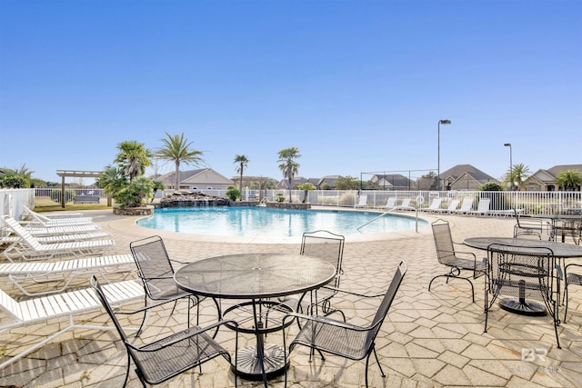 7091 Rocky Road Loop, Gulf Shores, AL 36542 - community pool featuring fence and a patio area